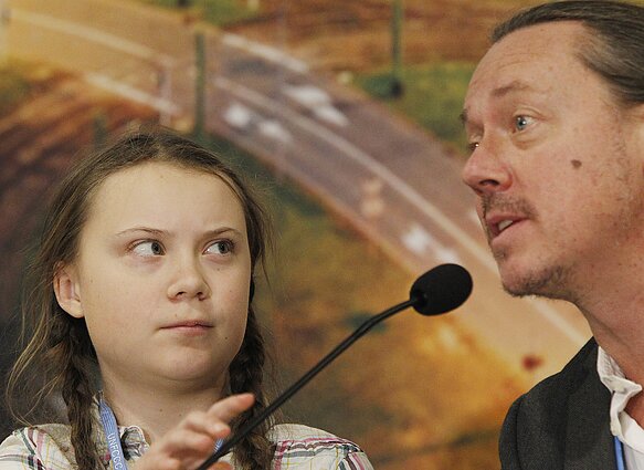 Greta Thunberg su tėvu Svante Thunbergu
