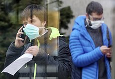 People wearing masks to lower risks of contracting and passing on Covid-19