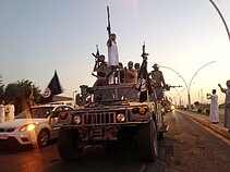 ISIS kovotojai Mosule (Irakas) 2014 m. ISIS kovotojai Mosule (Irakas) 2014 m.