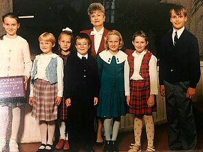 Ieva Dūdaitė vaikystėje (trečia iš kairės)