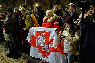 A crowd waiting released Belarusian prisoners at the US Embassy in Vilnius last Saturday