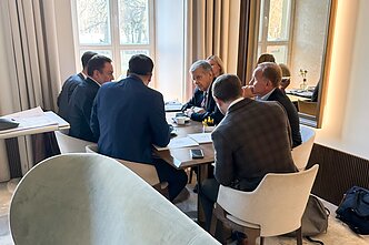 Petro Gražulio, Igno Vėgėlės, Rimo Jankūno susitikimas su John Coale