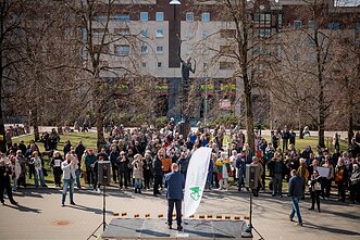 Around 100 people gathered outside the parliament on Thursday carrying Lithuanian flags and placards reading “Hands off Lithuania’s forests” and “No to forest destruction”.