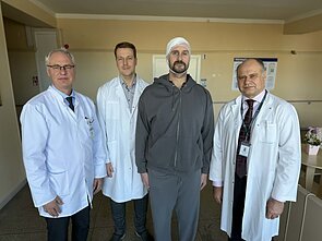 Gydytojai ir pacientas Irmantas