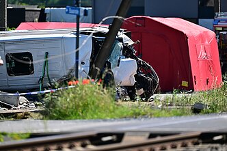 Belgijoje traukinys rėžėsi į mokyklinį autobusą