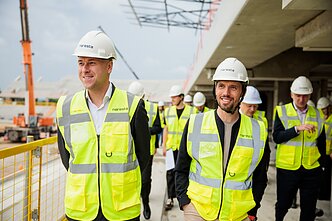 Penktadienį surengta spaudos konferencija Nacionalinio stadiono statybvietėje; Edgaras Stankevičius, Tadas Grincevičius