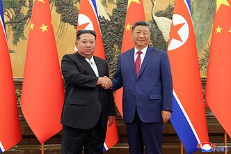 Kim Jong Unas ir Xi Jinpingas