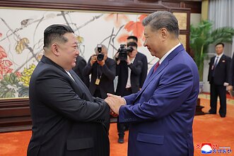 Xi Jinpingas ir Kim Jong Unas