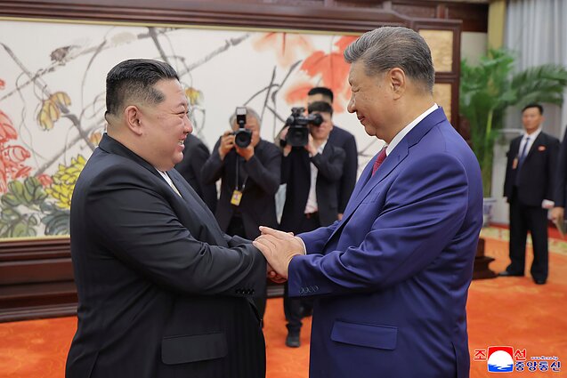 Xi Jinpingas ir Kim Jong Unas