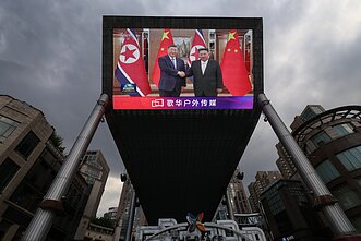 Xi Jinpingas Šiaurės Korėjoje susitiko su Kim Jong Unu
