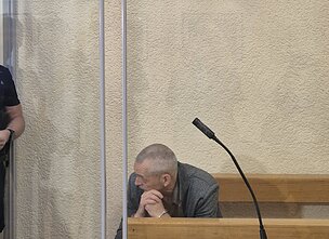 Į teismą atvežtas Justinos Sadauskienės (Gaigalaitės) tėvas Egidijus Gaigalas