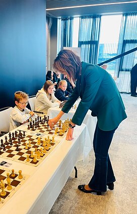Nikolas Bausys played with Lithuanian chess grandmaster and politician, former Speaker of Seimas, Viktorija Čmilyte-Nielsen. 
